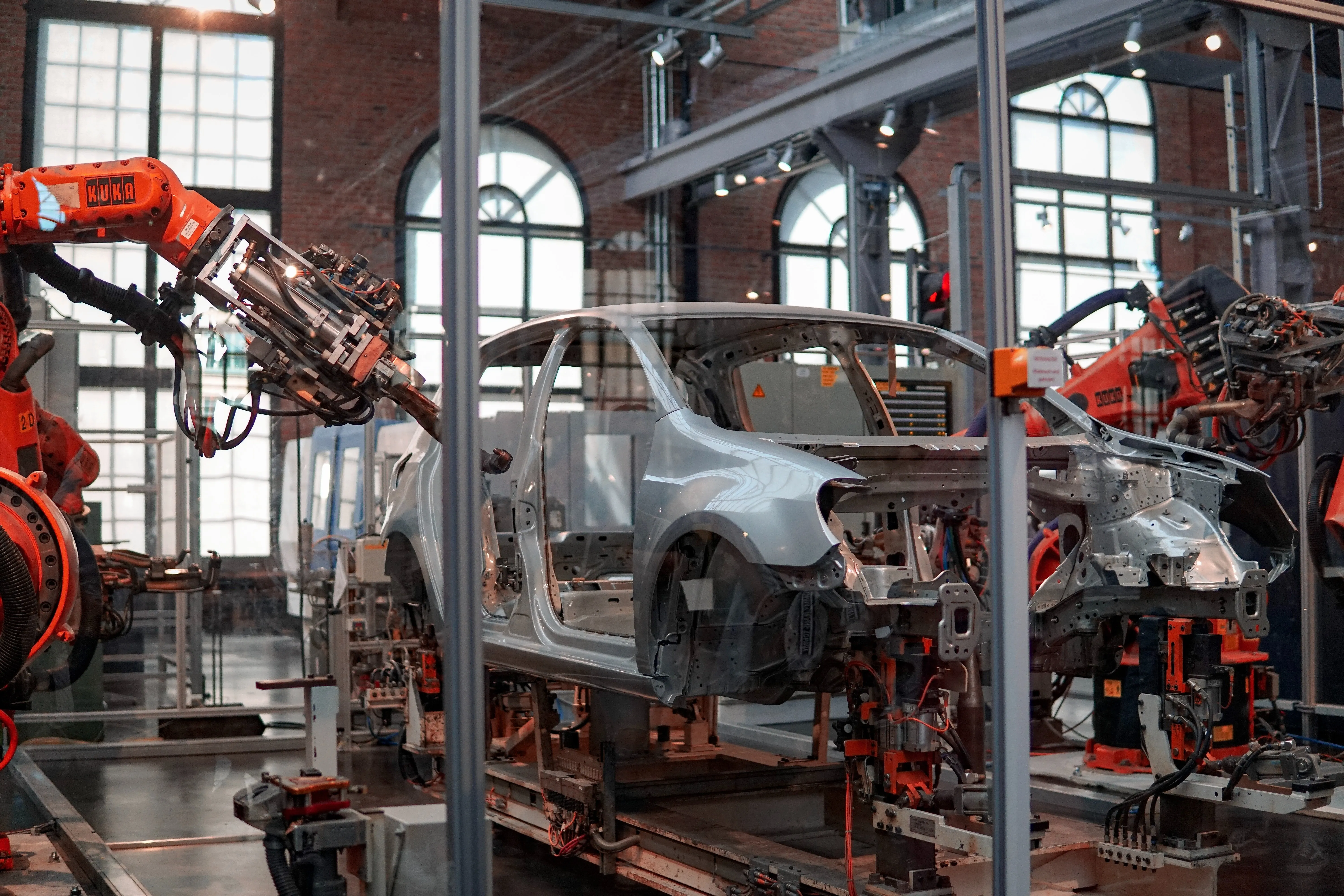 A car chassis being assembled in an automated factory line