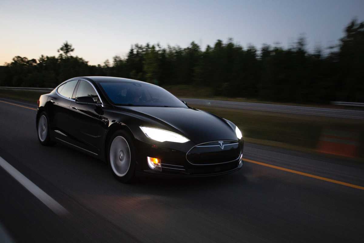 The Tesla Model S displayed as an aspirational luxury car with technological touch.